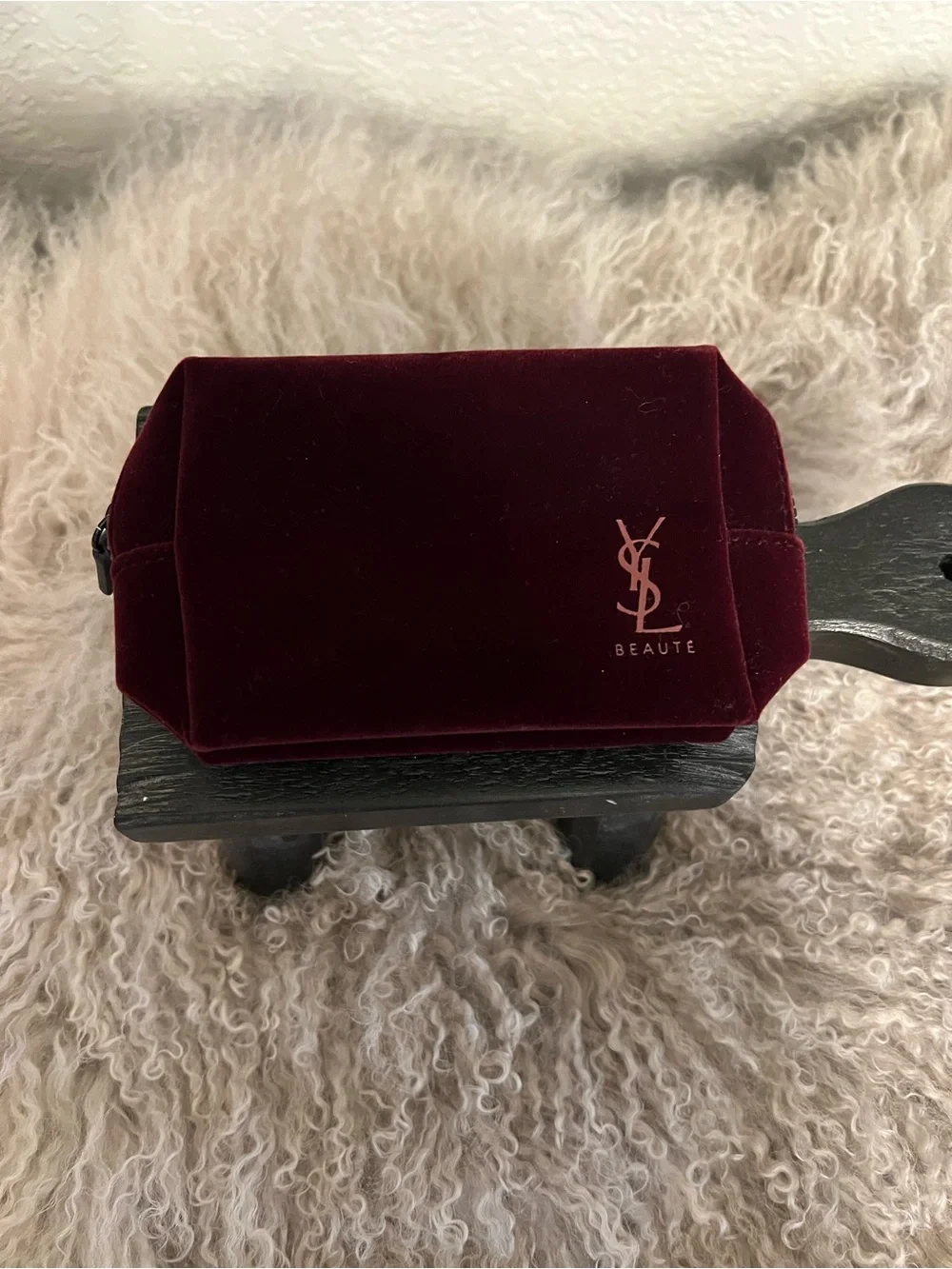 Yves Saint Laurent Velvet Makeup Case in Deep Burgundy size 6 by 4 inches.